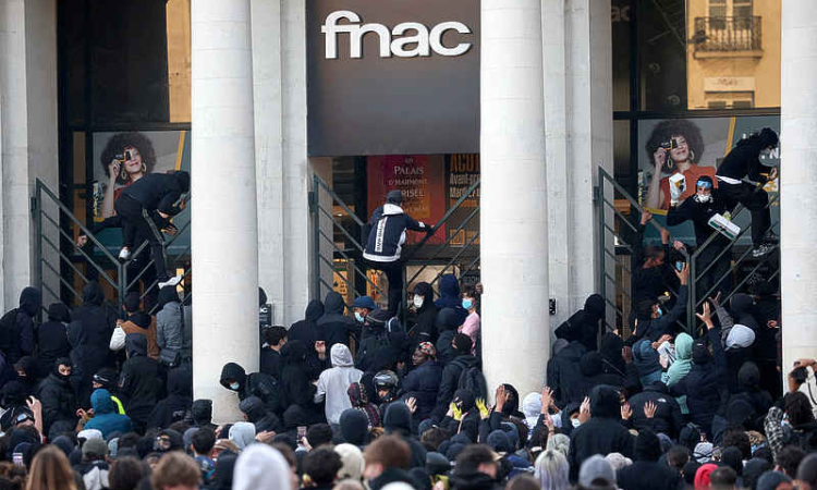 Macron urges calm as France counts the cost of worst unrest in years